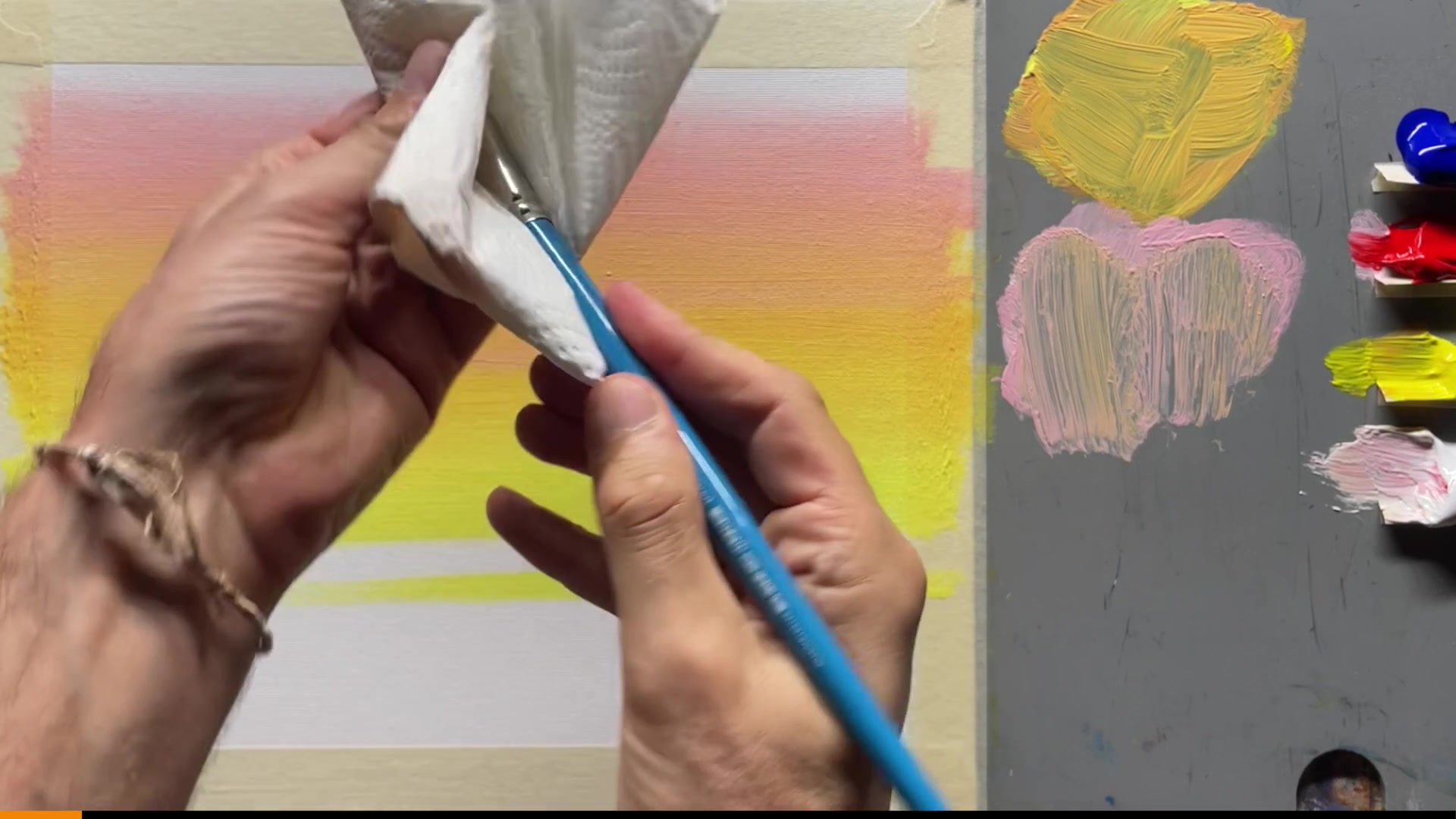 Step 6 — Mixing and applying the blue color (video frame from the lesson)