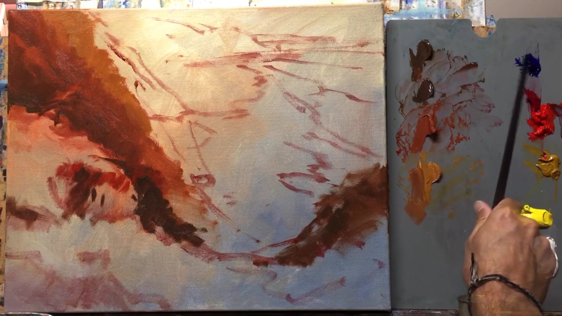 Step 5 — Painting light colors first (video frame from the lesson)