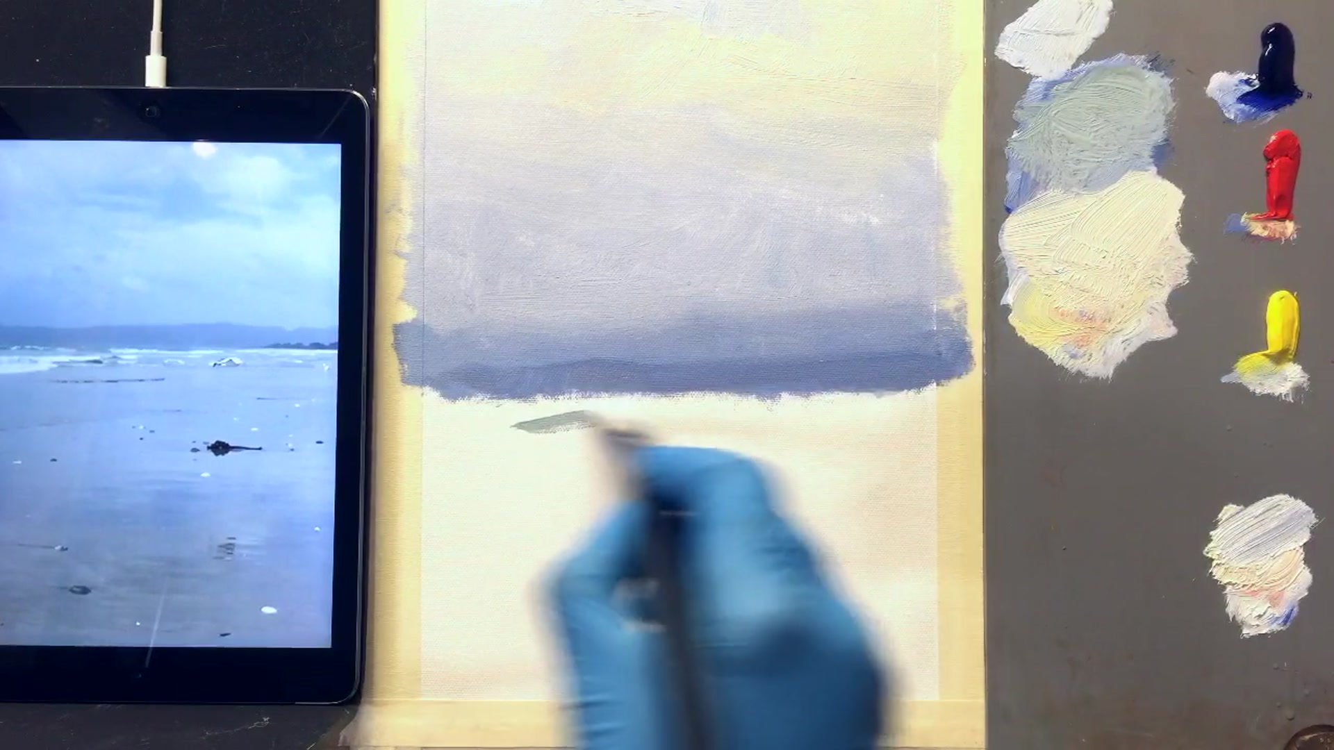 Step 3 — Painting the ocean and foreground (video frame from the lesson)