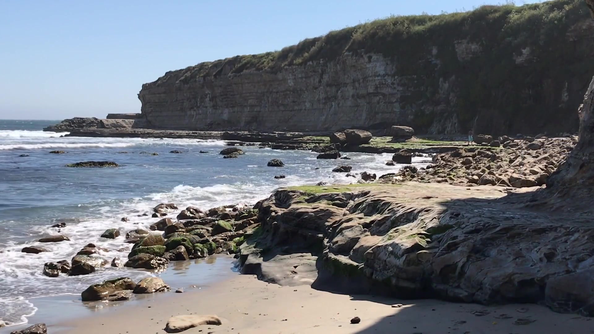 Step 3 — Mid-ground and atmospheric perspective (video frame from the lesson)