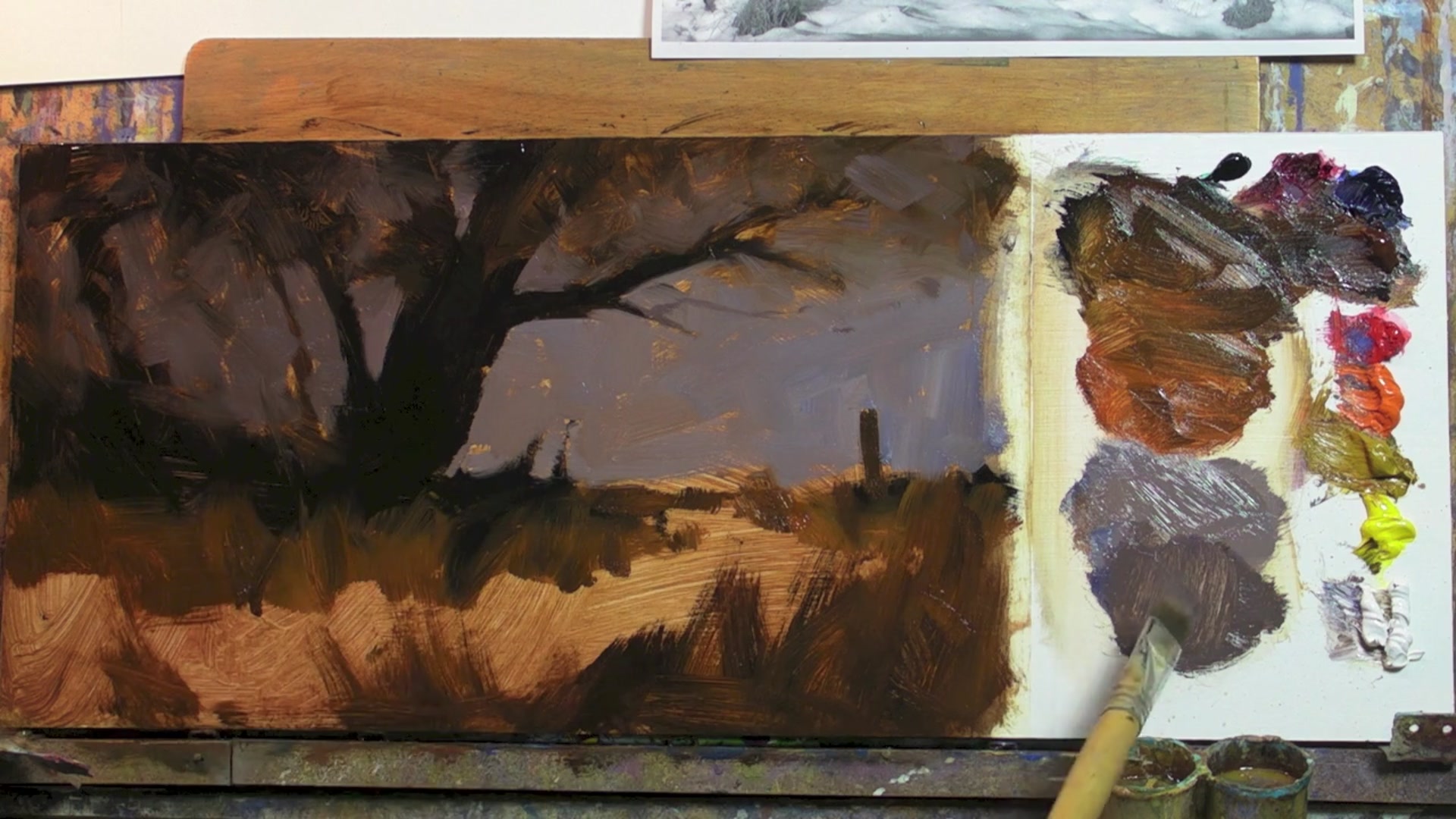 Step 11 — Painting snow shadows and edges (video frame from the lesson)