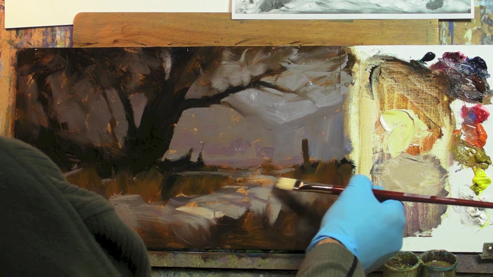 Step 13 — Painting snow highlights and texture (video frame from the lesson)