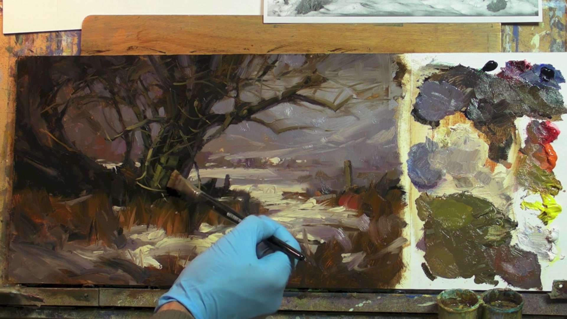 Step 16 — Final touches and signing (video frame from the lesson)