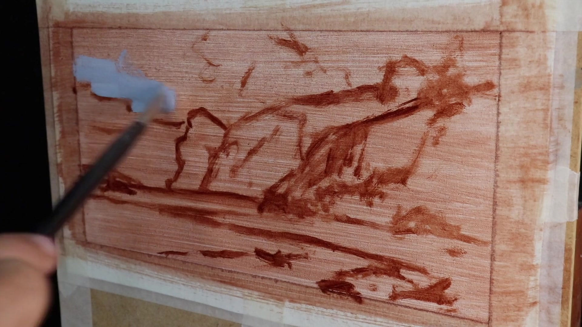 Step 4 — Painting cloud and headland shadows (video frame from the lesson)