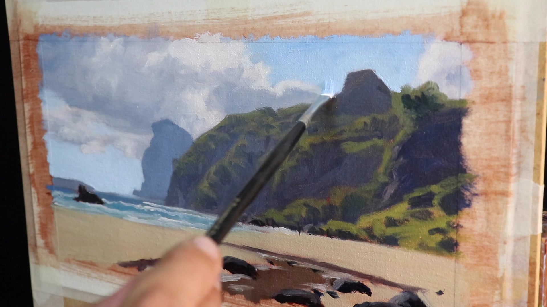 Step 16 — Modelling phase: Foliage and cliffs (video frame from the lesson)