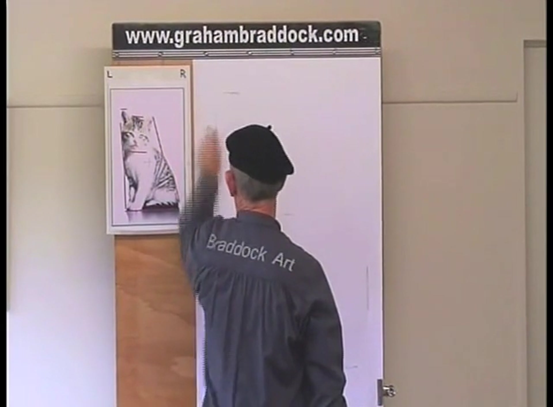 Step 3 — Drawing the kitten's body shape (video frame from the lesson)