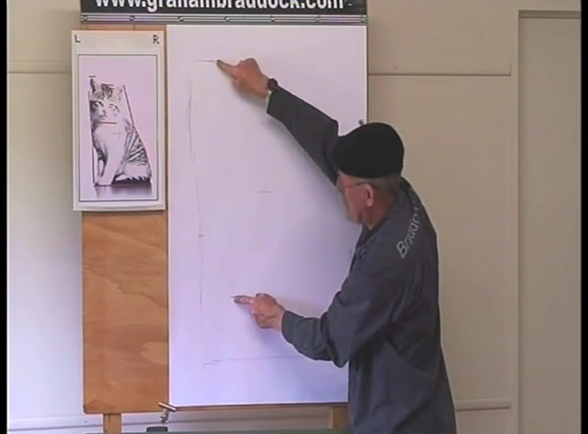 Step 5 — Marking key points on the page (video frame from the lesson)