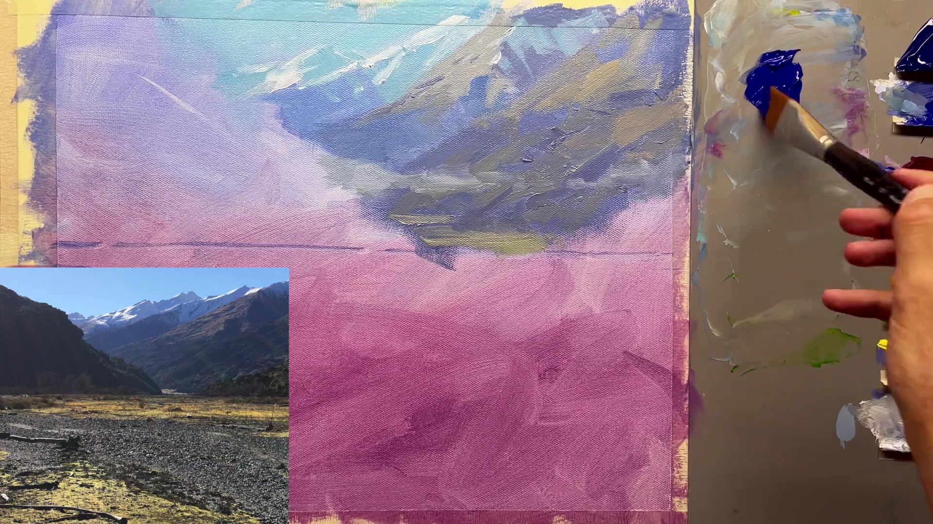Step 22 — Painting the foreground mountains (video frame from the lesson)