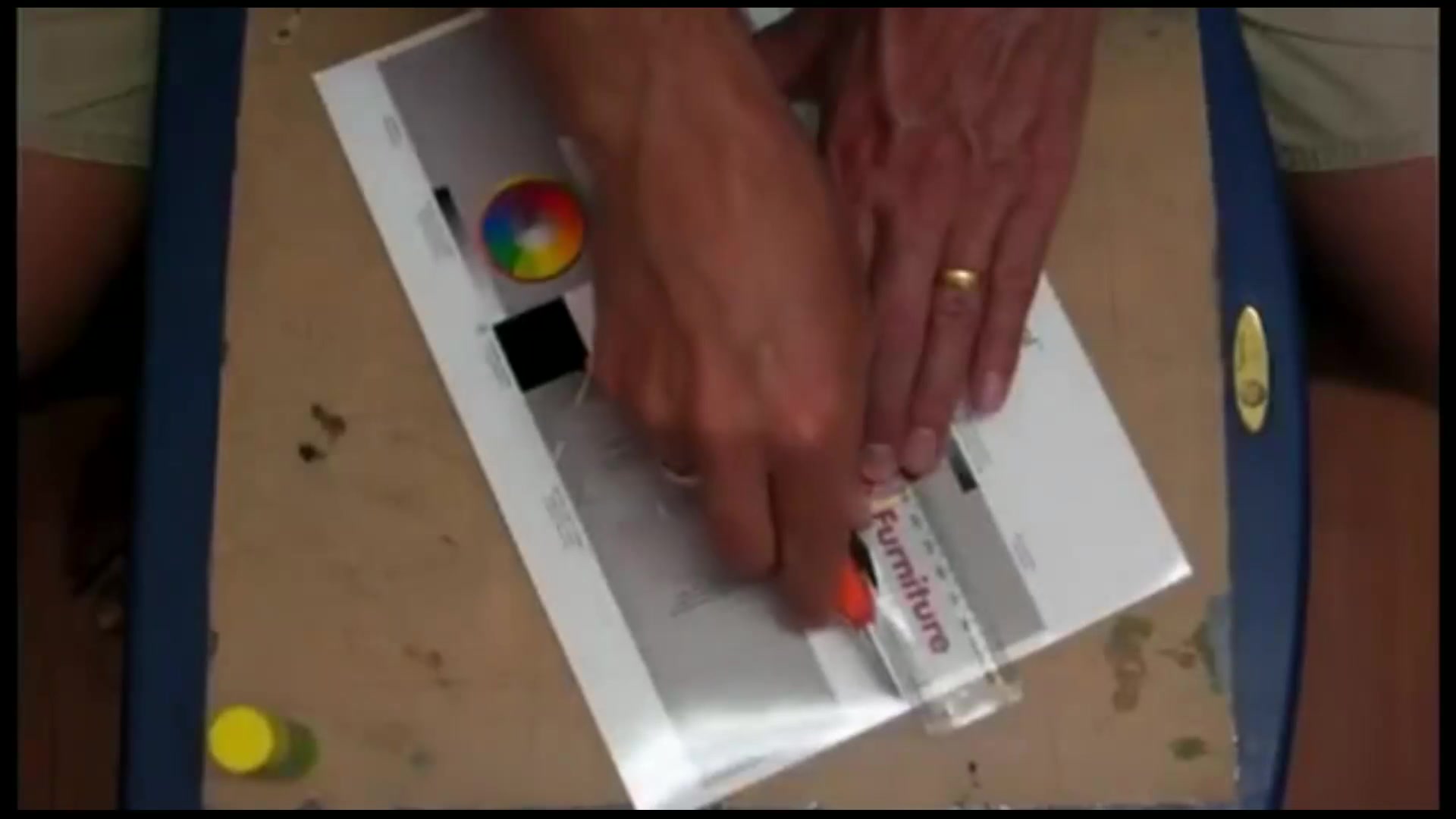 Step 10 — Folding and Scoring (video frame from the lesson)