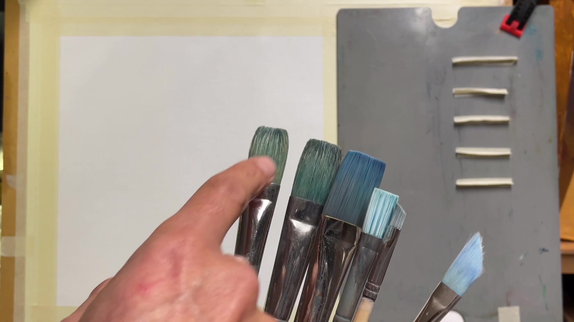 Step 13 — Brushes and palette (video frame from the lesson)