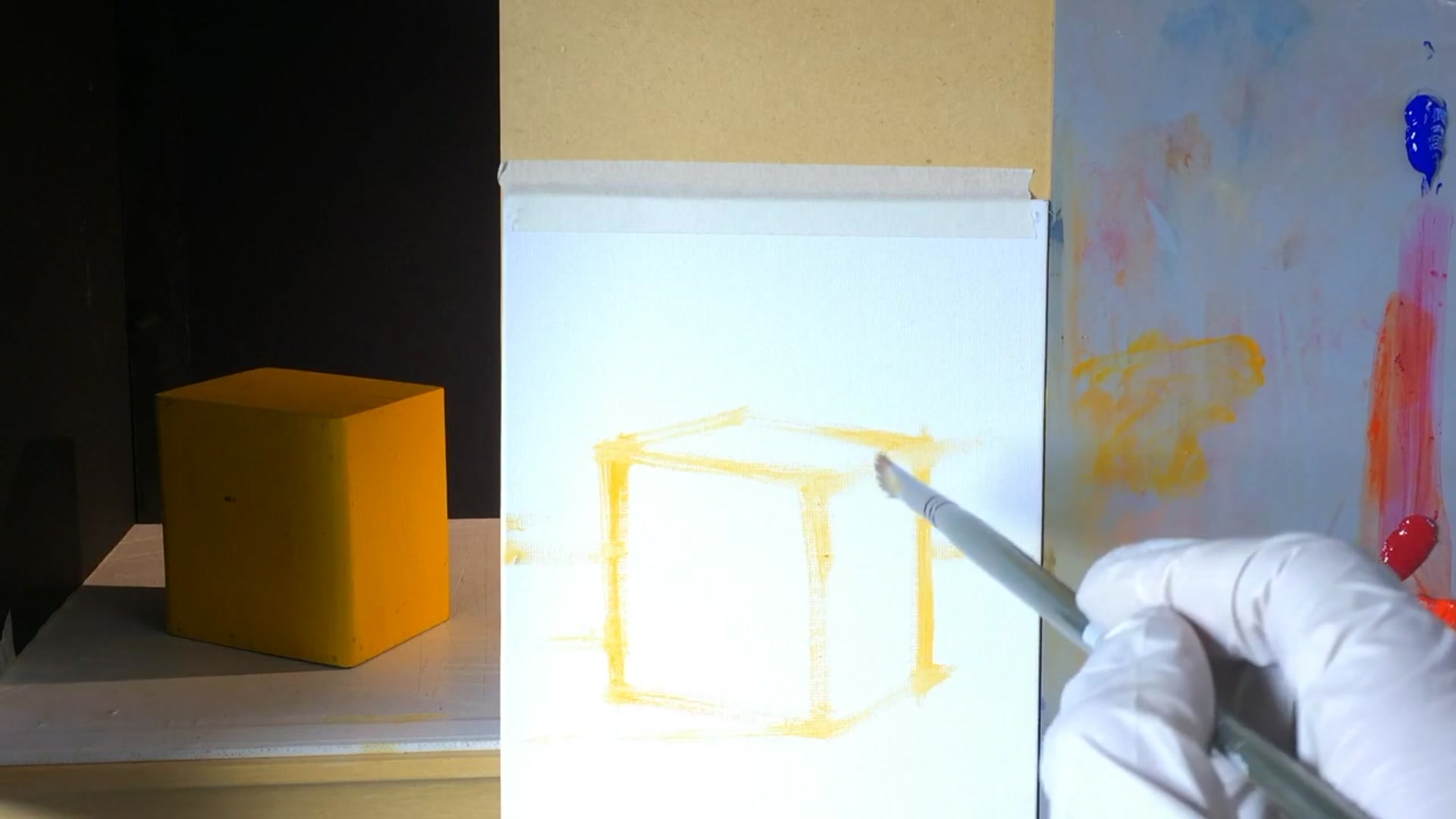 Step 2 — Painting the vibrant side (video frame from the lesson)