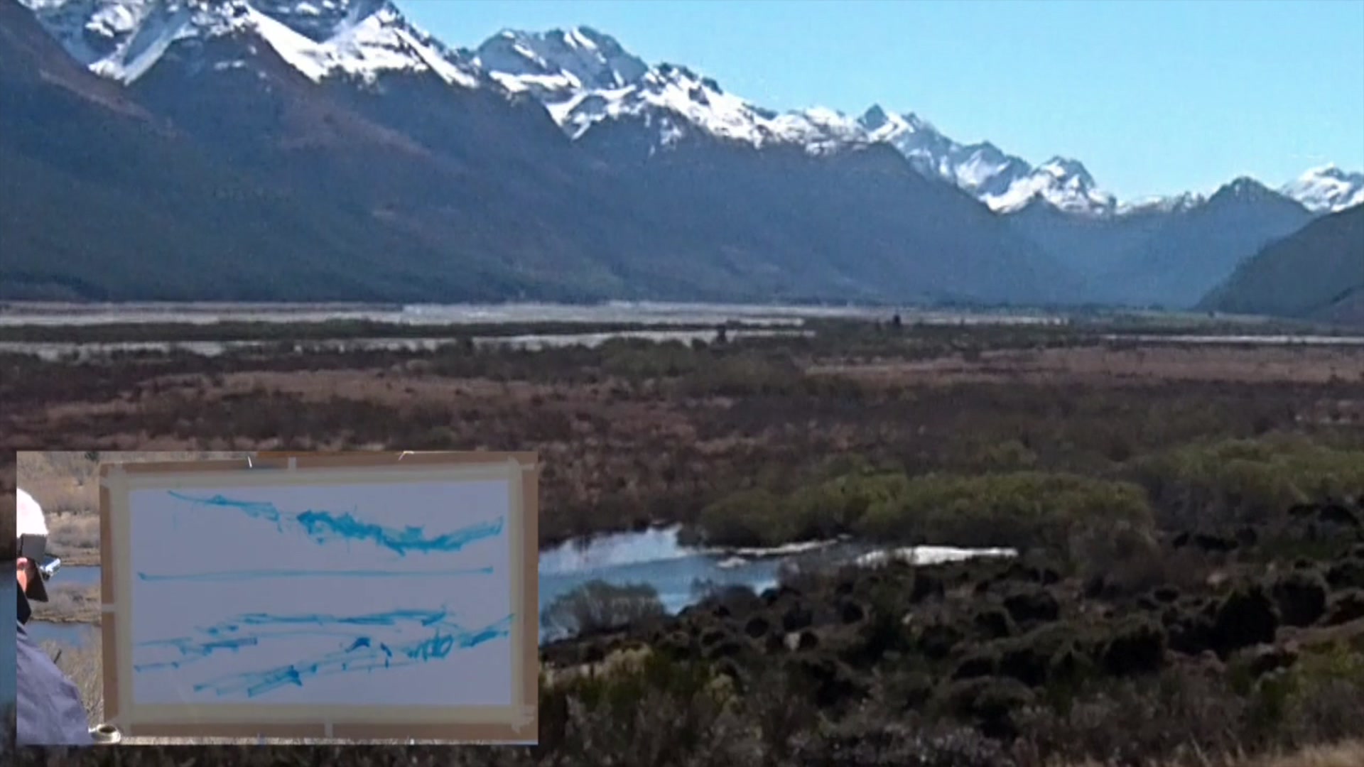 Step 2 — Focal point and mountain shapes (video frame from the lesson)