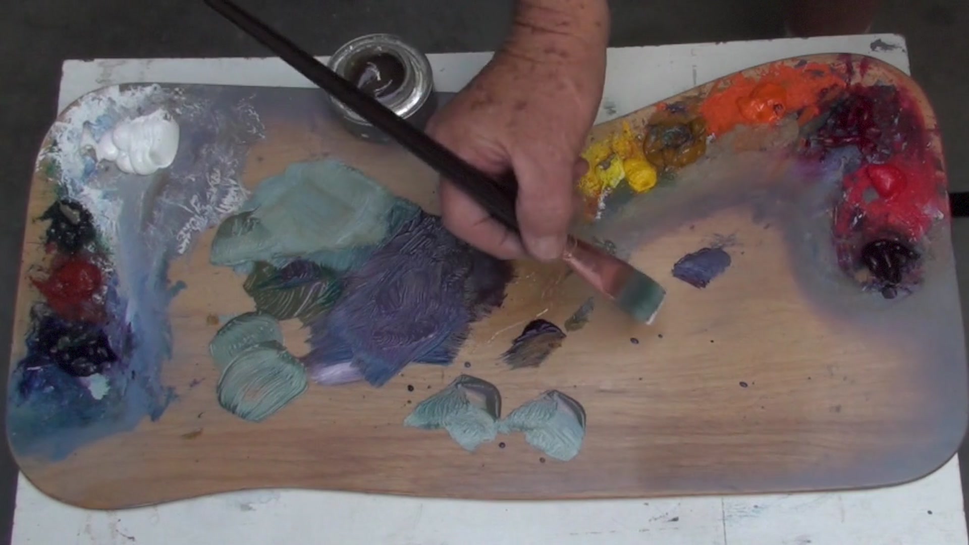 Step 7 — Mixing and Using Paint Efficiently (video frame from the lesson)