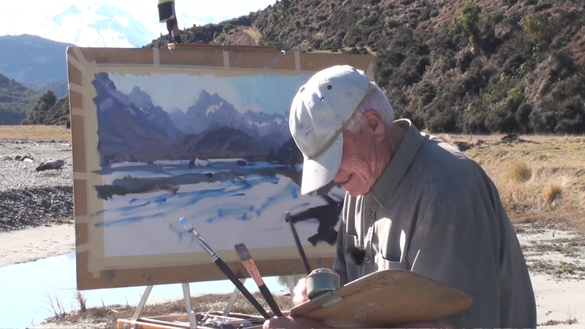 Step 22 — Highlighting Mountain Peaks (video frame from the lesson)