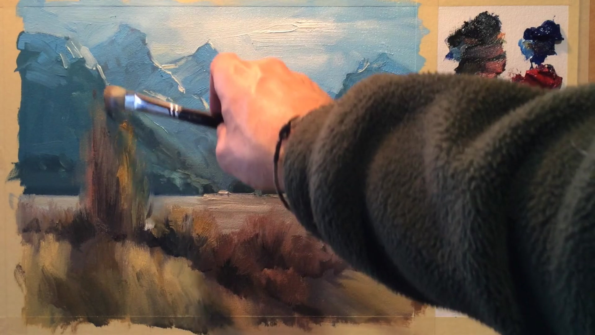 Step 13 — Adding sheep to the landscape (video frame from the lesson)